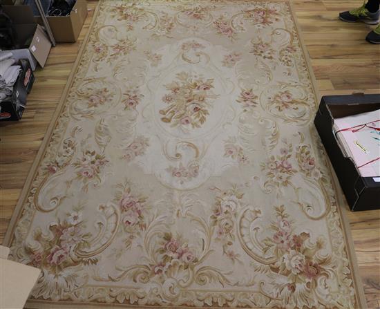 A small Aubusson style rug 150 x 250cm